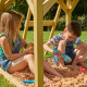 Aire de jeux cabane en bois dans les arbres TP Toys tour glissiere structure murs et portique FSC
