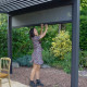 Pergola bioclimatique adossée en aluminium à lames inclinables 3x3 + store 3 M - Ombréa